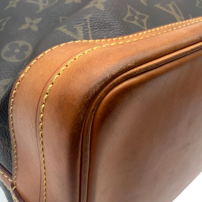 https://cdn.shopify.com/s/files/1/0564/9376/8855/files/Louis_Vuitton_Schultertasche_Sac_Noe_Grande_monogram_braun_vintage_LV6025.webp?v=1778082483
