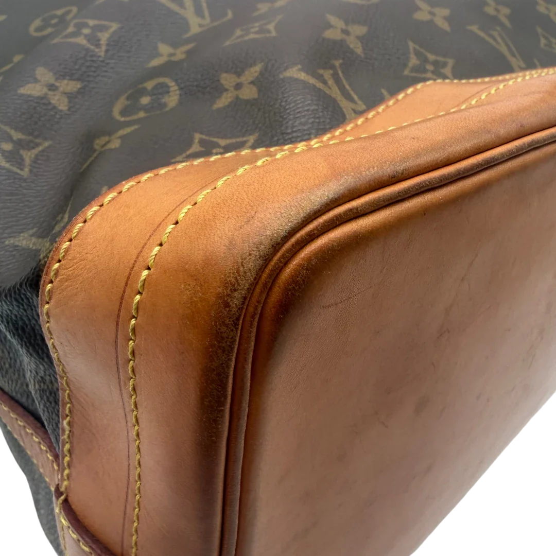 https://cdn.shopify.com/s/files/1/0564/9376/8855/files/Louis_Vuitton_Schultertasche_Sac_Noe_Grande_monogram_braun_vintage_LV6027.webp?v=1778082483