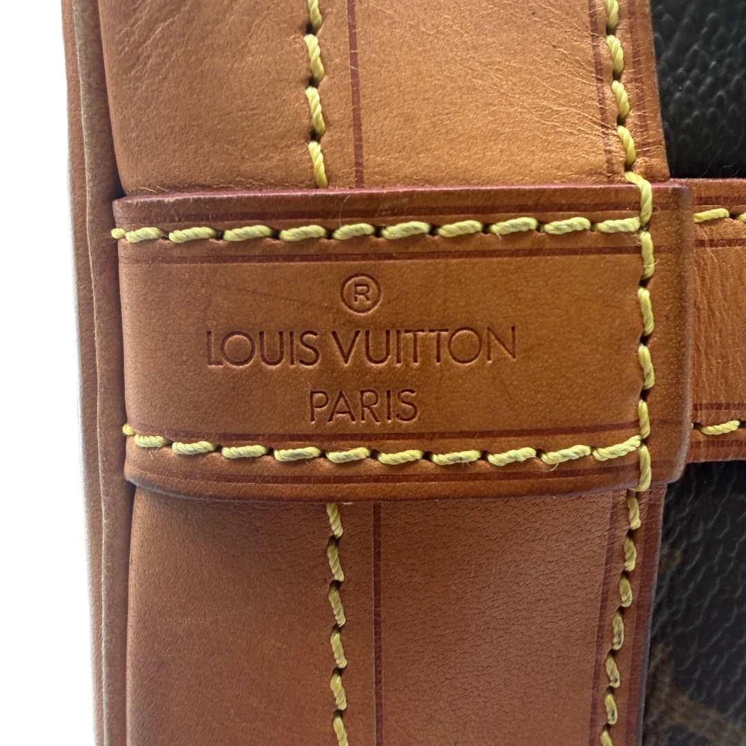 https://cdn.shopify.com/s/files/1/0564/9376/8855/files/Louis_Vuitton_Schultertasche_Sac_Noe_Grande_monogram_braun_vintage_LV6031.webp?v=1778082483
