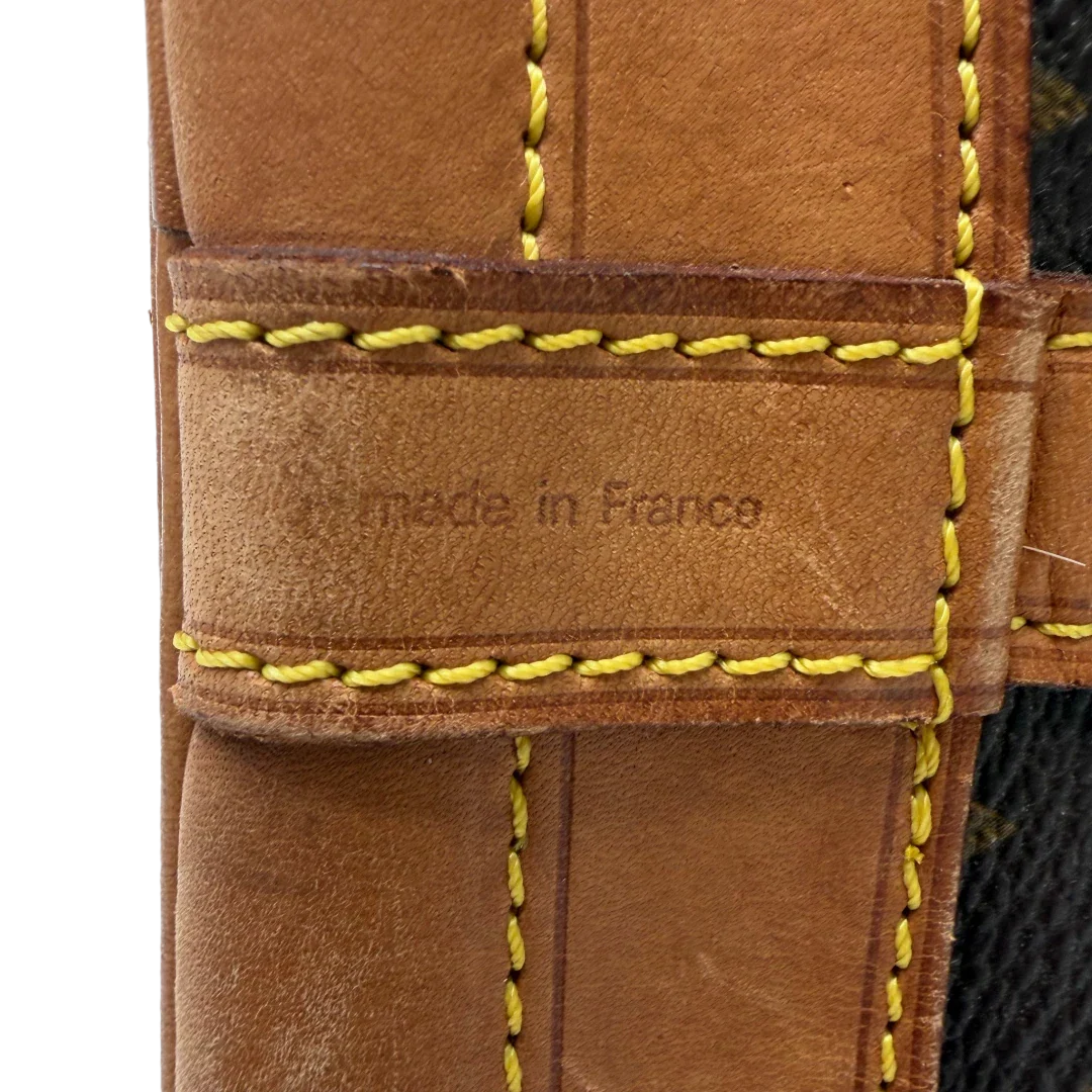 https://cdn.shopify.com/s/files/1/0564/9376/8855/files/Louis_Vuitton_Schultertasche_Sac_Noe_Grande_monogram_braun_vintage_LV7665.webp?v=1780488071