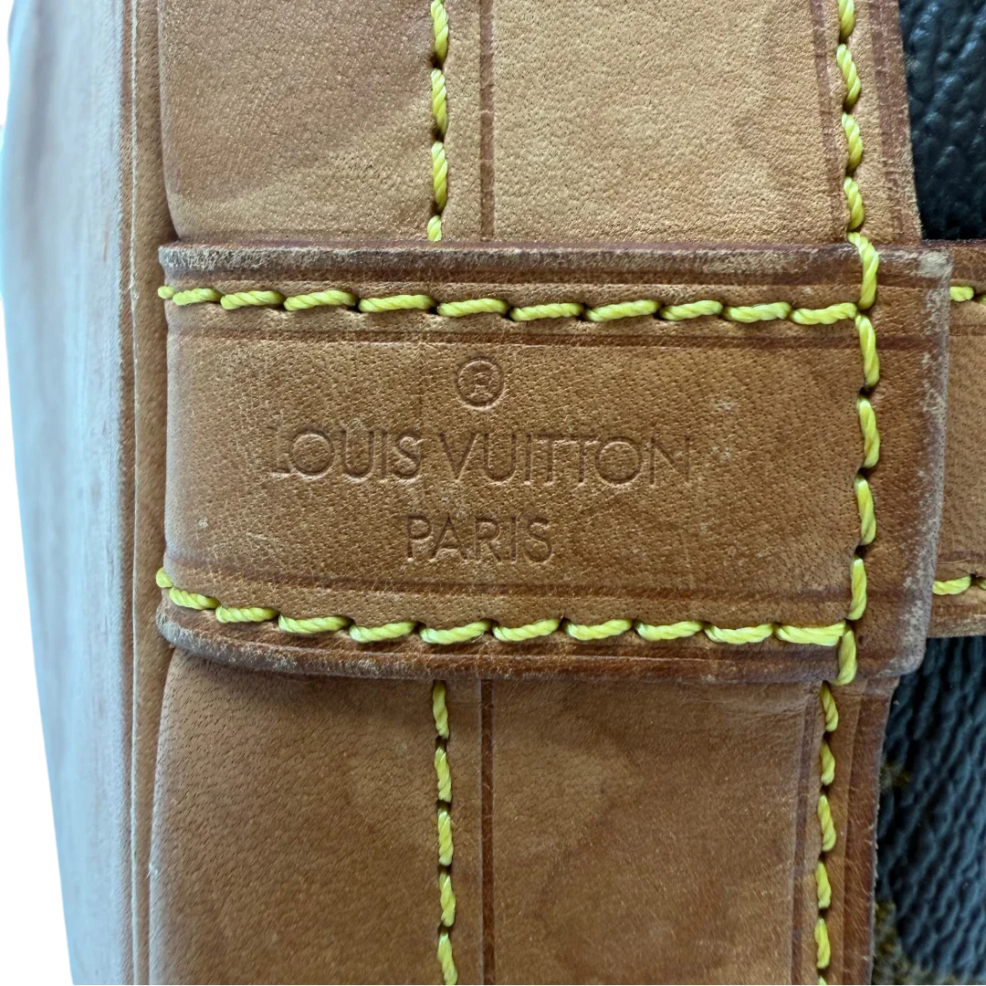 https://cdn.shopify.com/s/files/1/0564/9376/8855/files/Louis_Vuitton_Schultertasche_Sac_Noe_Grande_monogram_braun_vintage_LV7666.webp?v=1780488071