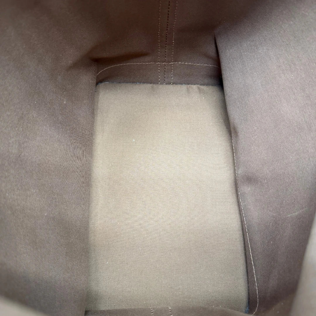 https://cdn.shopify.com/s/files/1/0564/9376/8855/files/Louis_Vuitton_Schultertasche_Sac_Noe_Grande_monogram_braun_vintage_LV7667.webp?v=1780488071