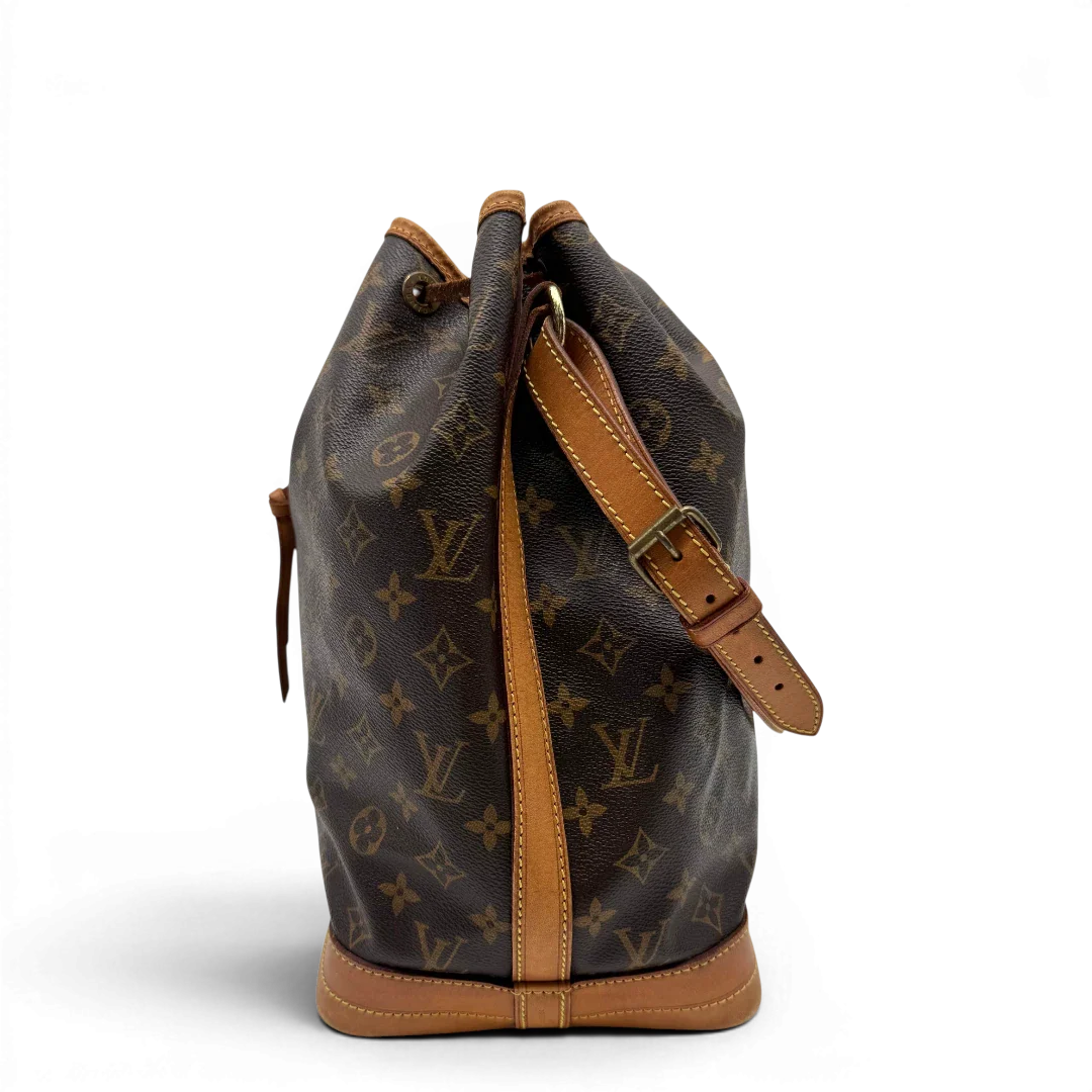 https://cdn.shopify.com/s/files/1/0564/9376/8855/files/Louis_Vuitton_Schultertasche_Sac_Noe_grande_monogram_braun_vintage_LV2175.webp?v=1779963003