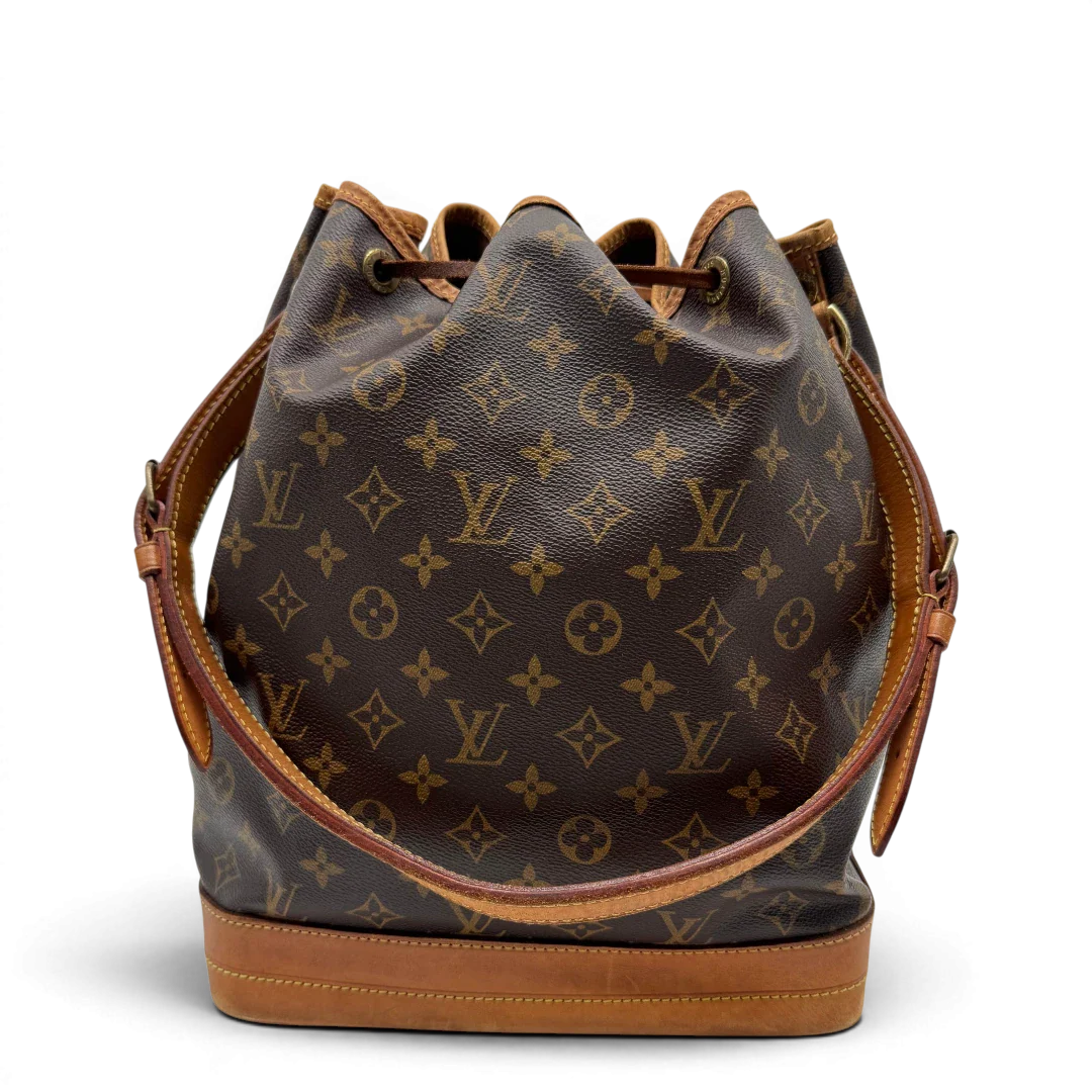https://cdn.shopify.com/s/files/1/0564/9376/8855/files/Louis_Vuitton_Schultertasche_Sac_Noe_grande_monogram_braun_vintage_LV2176.webp?v=1779963003