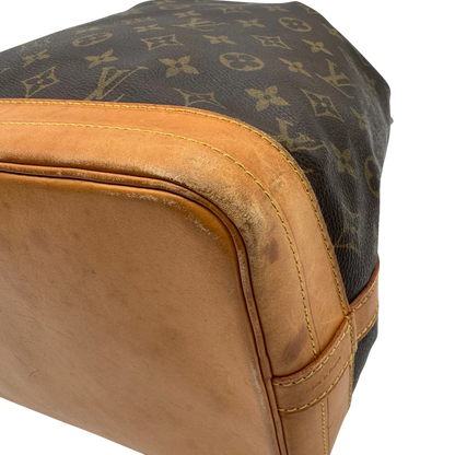 https://cdn.shopify.com/s/files/1/0564/9376/8855/files/Louis_Vuitton_Schultertasche_Sac_Noe_grande_monogram_braun_vintage_LV2199.webp?v=1779962922