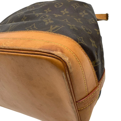 https://cdn.shopify.com/s/files/1/0564/9376/8855/files/Louis_Vuitton_Schultertasche_Sac_Noe_grande_monogram_braun_vintage_LV2201.webp?v=1779962922