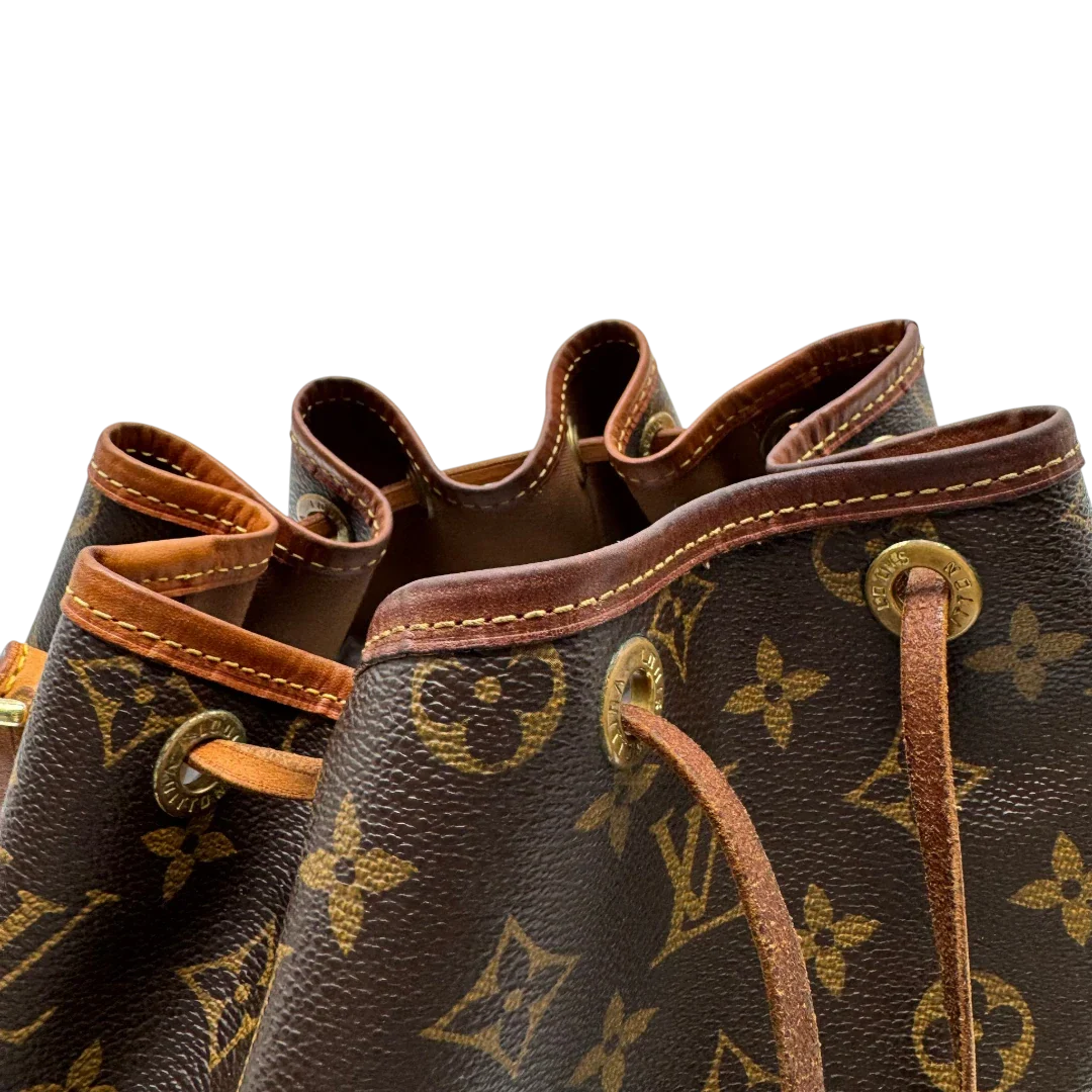 https://cdn.shopify.com/s/files/1/0564/9376/8855/files/Louis_Vuitton_Schultertasche_Sac_Noe_grande_monogram_braun_vintage_LV2238.webp?v=1779963099