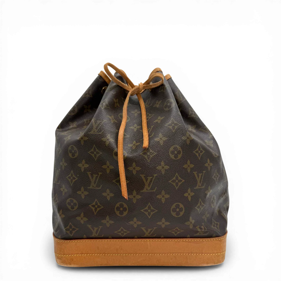 https://cdn.shopify.com/s/files/1/0564/9376/8855/files/Louis_Vuitton_Schultertasche_Sac_Noe_grande_monogram_braun_vintage_LV33692.webp?v=1774446325