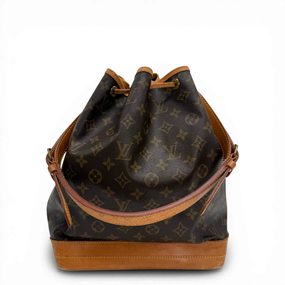 https://cdn.shopify.com/s/files/1/0564/9376/8855/files/Louis_Vuitton_Schultertasche_Sac_Noe_grande_monogram_braun_vintage_LV33702.webp?v=1774446325