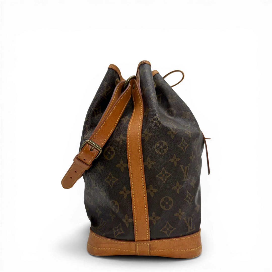 https://cdn.shopify.com/s/files/1/0564/9376/8855/files/Louis_Vuitton_Schultertasche_Sac_Noe_grande_monogram_braun_vintage_LV33712.webp?v=1774446325