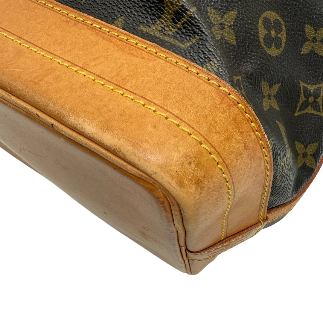 https://cdn.shopify.com/s/files/1/0564/9376/8855/files/Louis_Vuitton_Schultertasche_Sac_Noe_grande_monogram_braun_vintage_LV33742.webp?v=1774446325