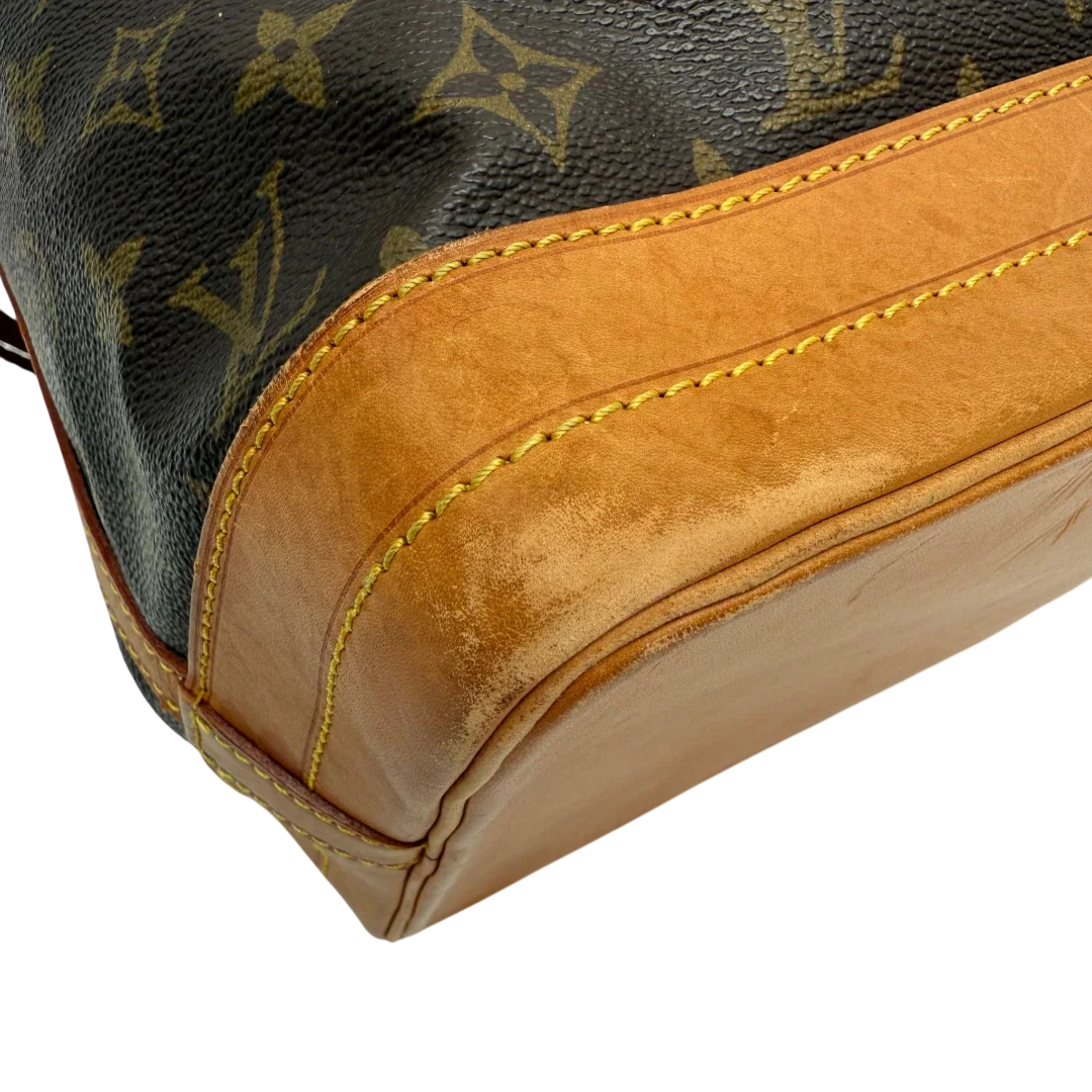 https://cdn.shopify.com/s/files/1/0564/9376/8855/files/Louis_Vuitton_Schultertasche_Sac_Noe_grande_monogram_braun_vintage_LV33752.webp?v=1774446325