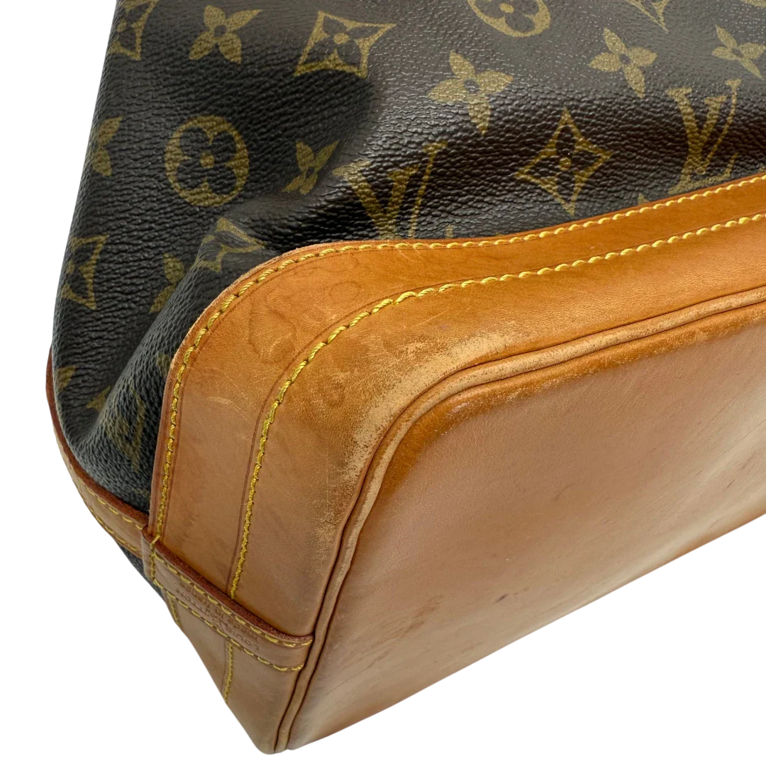 https://cdn.shopify.com/s/files/1/0564/9376/8855/files/Louis_Vuitton_Schultertasche_Sac_Noe_grande_monogram_braun_vintage_LV33772.webp?v=1774446325