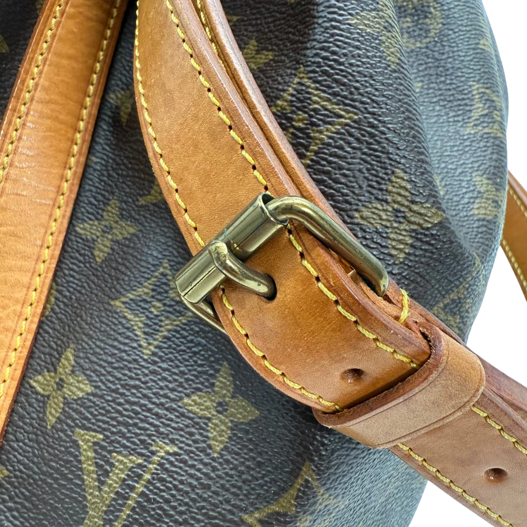 https://cdn.shopify.com/s/files/1/0564/9376/8855/files/Louis_Vuitton_Schultertasche_Sac_Noe_grande_monogram_braun_vintage_LV33812.webp?v=1774446325