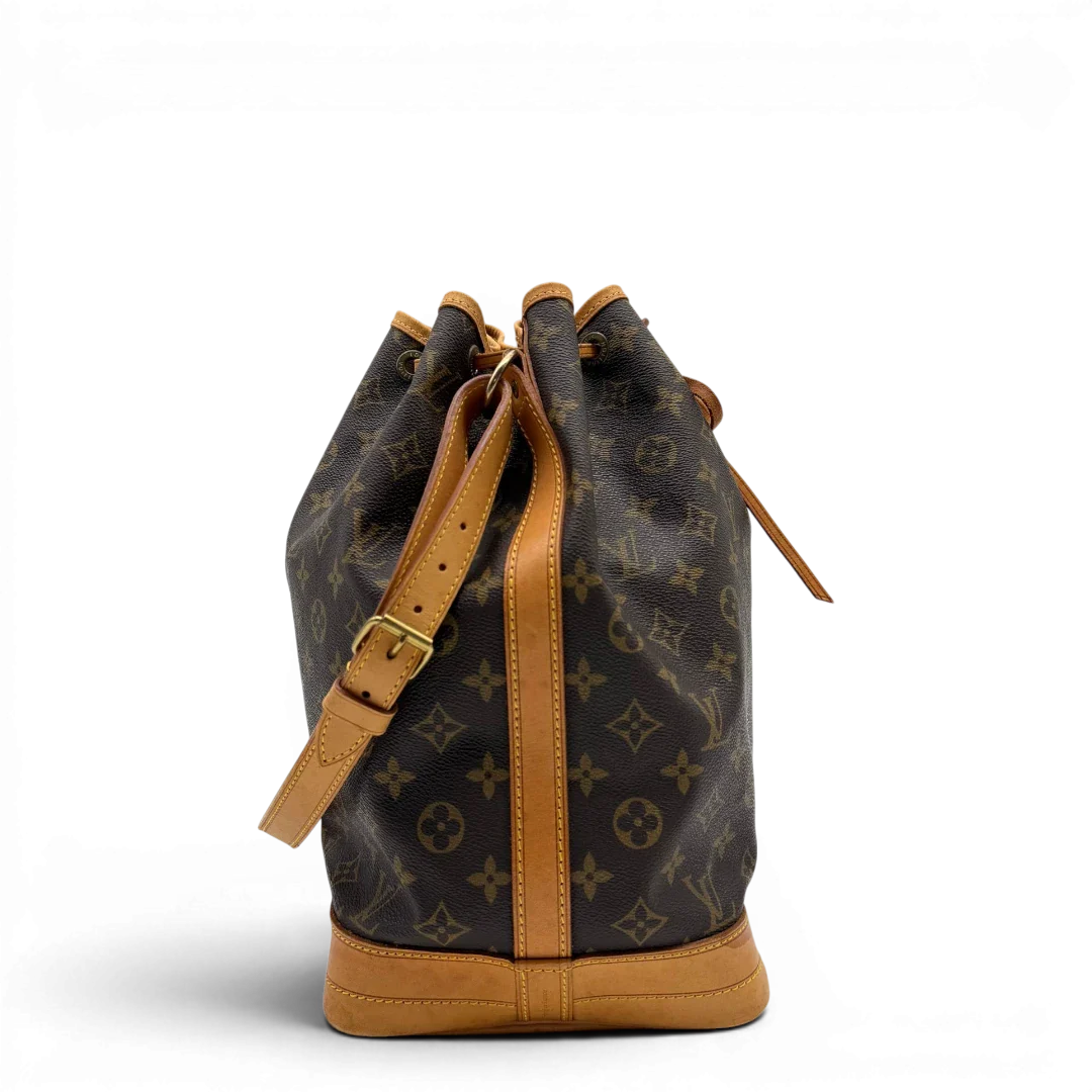 https://cdn.shopify.com/s/files/1/0564/9376/8855/files/Louis_Vuitton_Schultertasche_Sac_Noe_grande_monogram_braun_vintage_LV6425.webp?v=1778668749