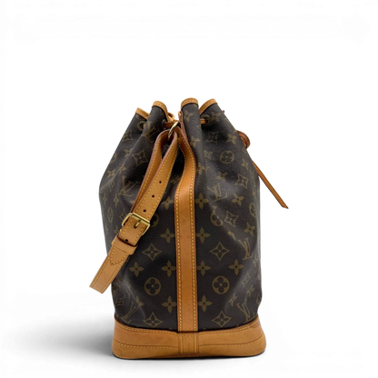 https://cdn.shopify.com/s/files/1/0564/9376/8855/files/Louis_Vuitton_Schultertasche_Sac_Noe_grande_monogram_braun_vintage_LV6425.webp?v=1778668749