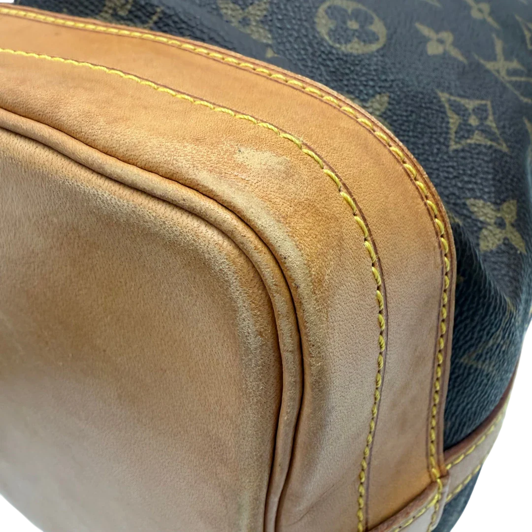 https://cdn.shopify.com/s/files/1/0564/9376/8855/files/Louis_Vuitton_Schultertasche_Sac_Noe_grande_monogram_braun_vintage_LV6427.webp?v=1778668749