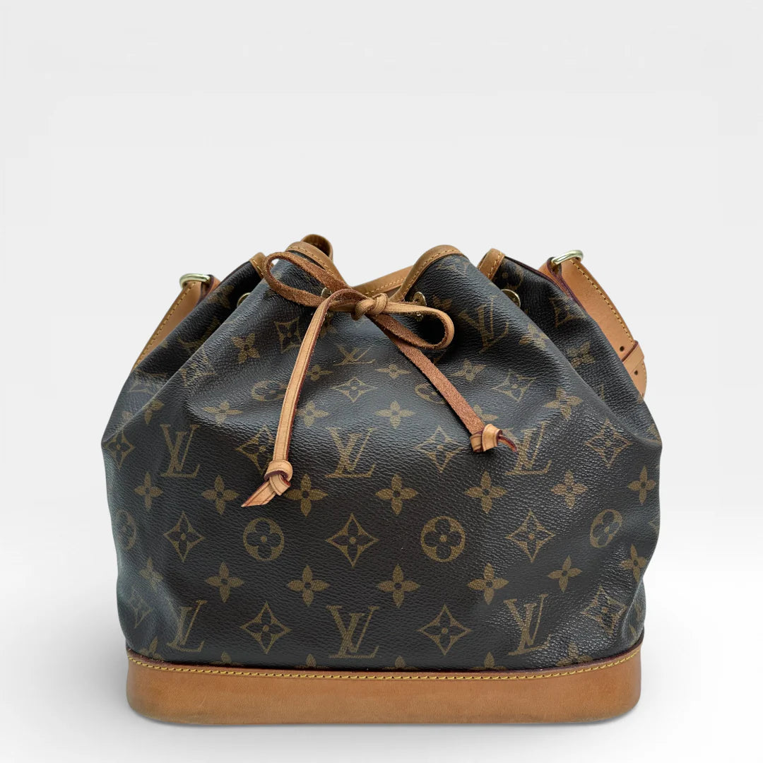 https://cdn.shopify.com/s/files/1/0564/9376/8855/files/Louis_Vuitton_Schultertasche_Sac_Noe_grande_monogram_braun_vintage_LV_1575.webp?v=1767923582
