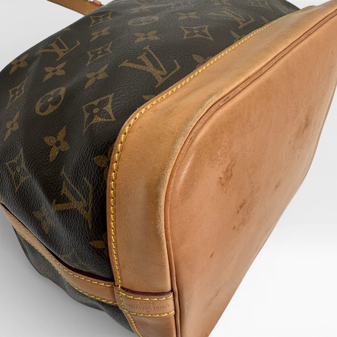 https://cdn.shopify.com/s/files/1/0564/9376/8855/files/Louis_Vuitton_Schultertasche_Sac_Noe_grande_monogram_braun_vintage_LV_1586.webp?v=1768202581