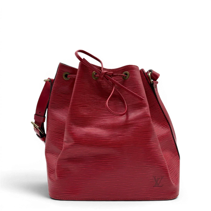 https://cdn.shopify.com/s/files/1/0564/9376/8855/files/Louis_Vuitton_Schultertasche_Sac_Noe_petit_Epi_aus_Leder_rot_vintage_LV6513.webp?v=1778681400