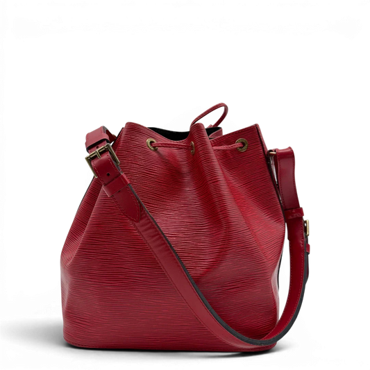 https://cdn.shopify.com/s/files/1/0564/9376/8855/files/Louis_Vuitton_Schultertasche_Sac_Noe_petit_Epi_aus_Leder_rot_vintage_LV6514.webp?v=1778681400