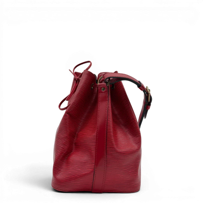 https://cdn.shopify.com/s/files/1/0564/9376/8855/files/Louis_Vuitton_Schultertasche_Sac_Noe_petit_Epi_aus_Leder_rot_vintage_LV6515.webp?v=1778681400