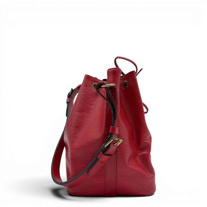 https://cdn.shopify.com/s/files/1/0564/9376/8855/files/Louis_Vuitton_Schultertasche_Sac_Noe_petit_Epi_aus_Leder_rot_vintage_LV6516.webp?v=1778681400