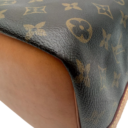 https://cdn.shopify.com/s/files/1/0564/9376/8855/files/Louis_Vuitton_Schultertasche_Sac_Noe_petit_monogram_braun_vintage_LV6102.webp?v=1778081005