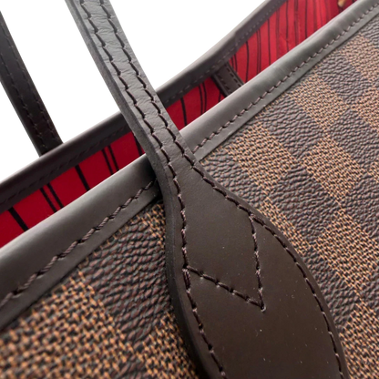 https://cdn.shopify.com/s/files/1/0564/9376/8855/files/Louis_Vuitton_Shopper_Neverfull_GM_Damier_Ebene_braun_11.webp?v=1781773037