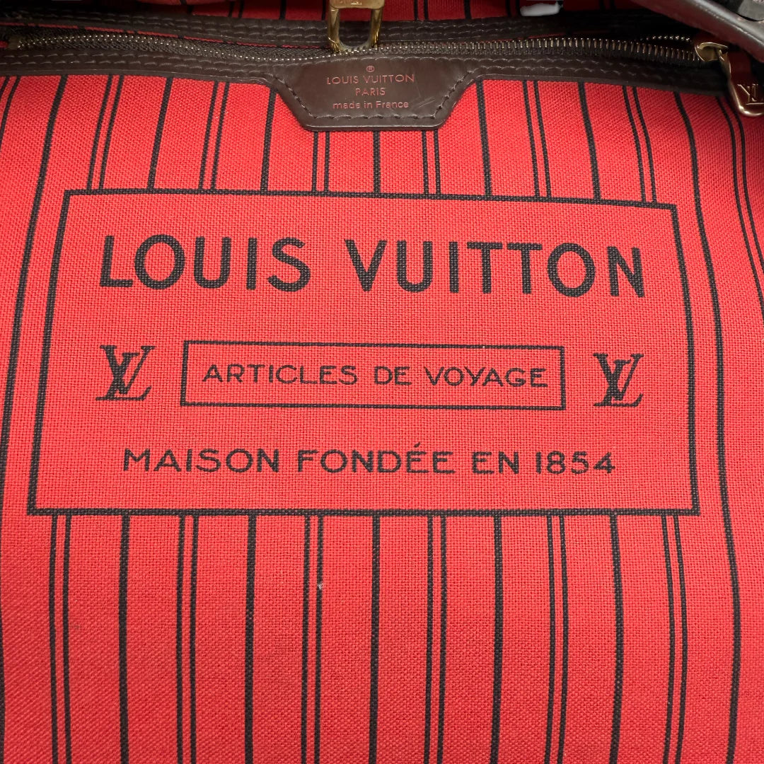 https://cdn.shopify.com/s/files/1/0564/9376/8855/files/Louis_Vuitton_Shopper_Neverfull_MM_Damier_Ebene_braun_vintage_LV_7614.webp?v=1767926772