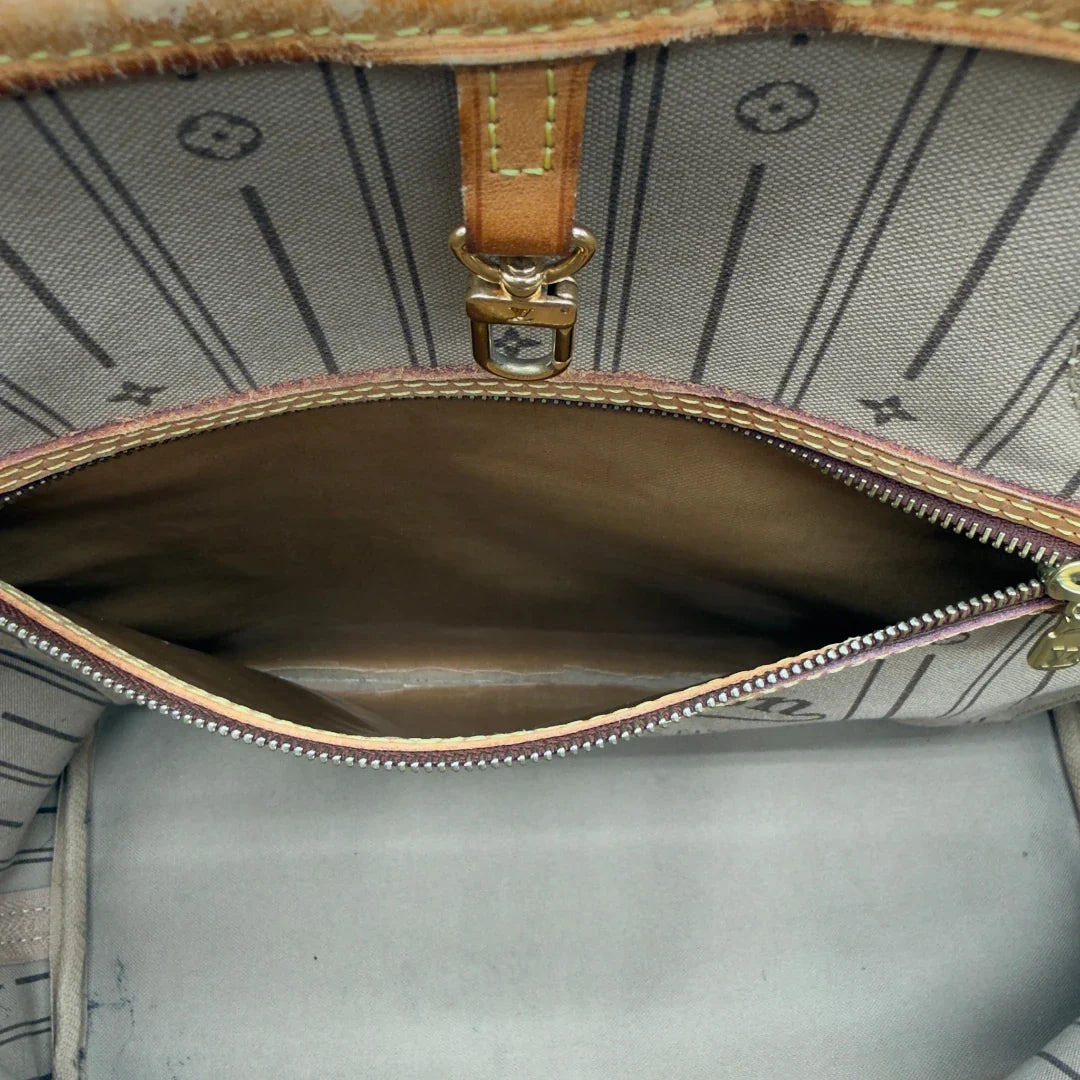 https://cdn.shopify.com/s/files/1/0564/9376/8855/files/Louis_Vuitton_Shopper_Neverfull_MM_monogram_braun_vintage_LV8468.webp?v=1780486336