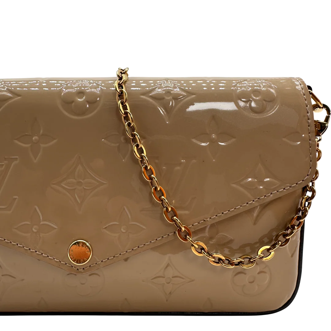 https://cdn.shopify.com/s/files/1/0564/9376/8855/files/Louis_Vuitton_Umhaengetasche_Felice_Multi_Pochette_Vernis_Monogram_beige_vintage_LV_2186.webp?v=1769739465