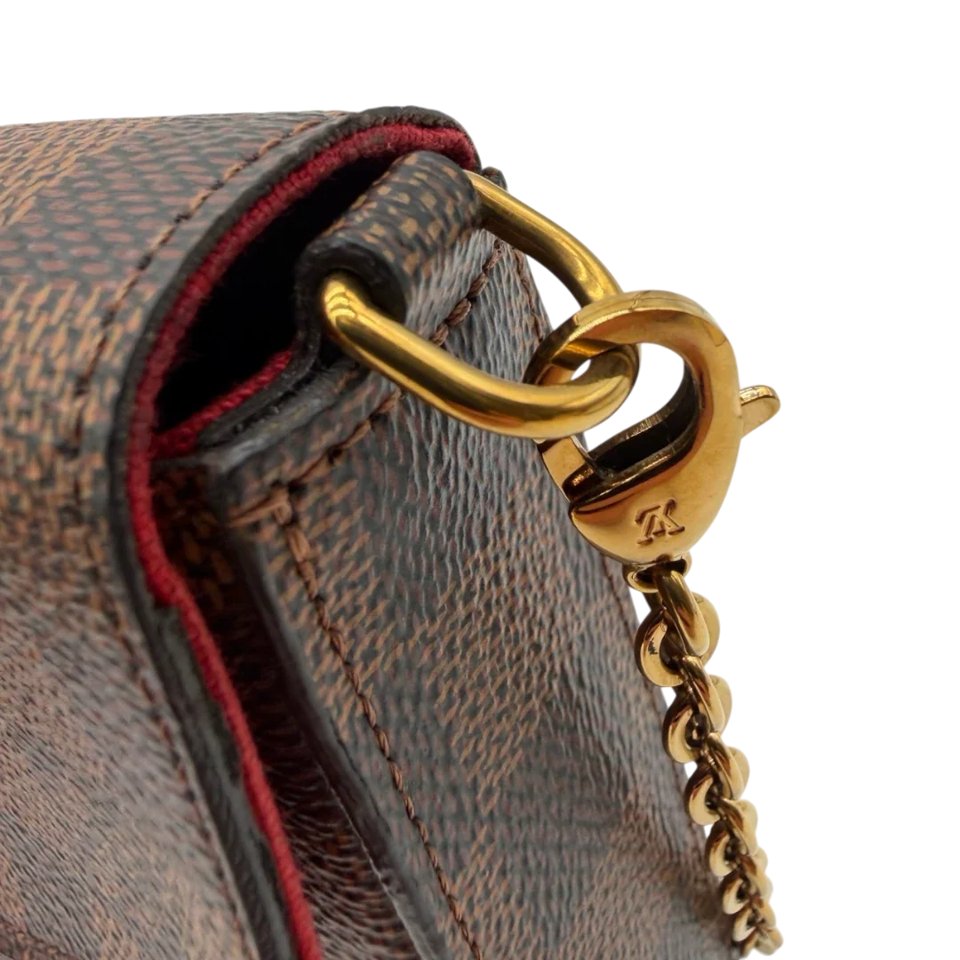 https://cdn.shopify.com/s/files/1/0564/9376/8855/files/Louis_Vuitton_Umhangetasche_Felice_Multi_Pochette_Damier_Ebene_15.webp?v=1784897569