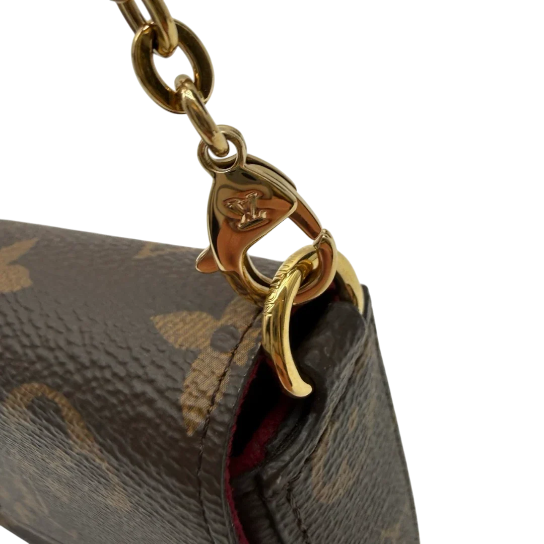 https://cdn.shopify.com/s/files/1/0564/9376/8855/files/Louis_Vuitton_Umhangetasche_Felice_Multi_Pochette_monogram_braun_16.webp?v=1784897857