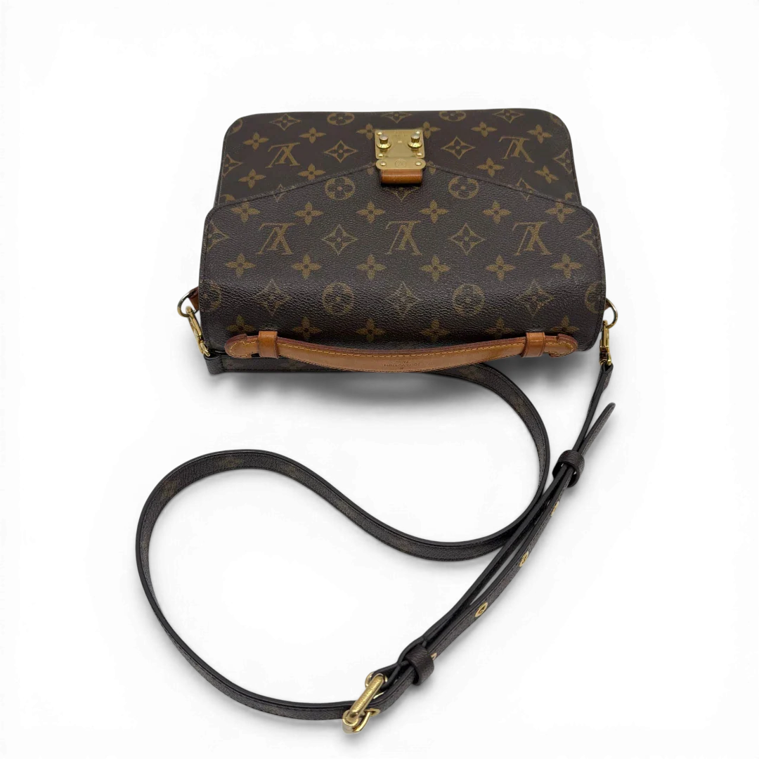 https://cdn.shopify.com/s/files/1/0564/9376/8855/files/Louis_Vuitton_Umhangetasche_Pochette_Metis_monogram_braun_vintage_LV34422.webp?v=1774404212