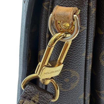 https://cdn.shopify.com/s/files/1/0564/9376/8855/files/Louis_Vuitton_Umhangetasche_Pochette_Metis_monogram_braun_vintage_LV34452.webp?v=1774404212
