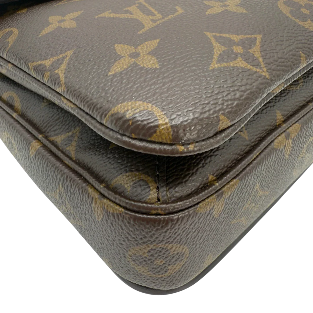 https://cdn.shopify.com/s/files/1/0564/9376/8855/files/Louis_Vuitton_Umhangetasche_Pochette_Metis_monogram_braun_vintage_LV5996.webp?v=1778083222