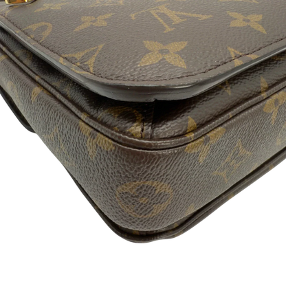 https://cdn.shopify.com/s/files/1/0564/9376/8855/files/Louis_Vuitton_Umhangetasche_Pochette_Metis_monogram_braun_vintage_LV5998.webp?v=1778083222