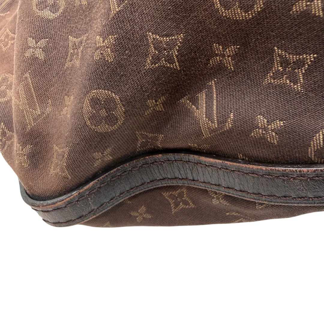 https://cdn.shopify.com/s/files/1/0564/9376/8855/files/Louis_Vuitton_Umhangetasche_Rhapsody_MM_aus_Denimstoff_braun_vintage_LV7426.webp?v=1779964088
