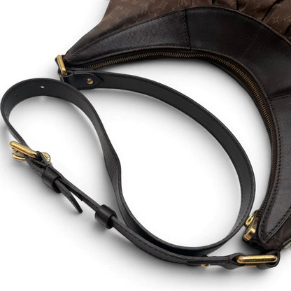 https://cdn.shopify.com/s/files/1/0564/9376/8855/files/Louis_Vuitton_Umhangetasche_Rhapsody_MM_aus_Denimstoff_braun_vintage_LV7429.webp?v=1779964089