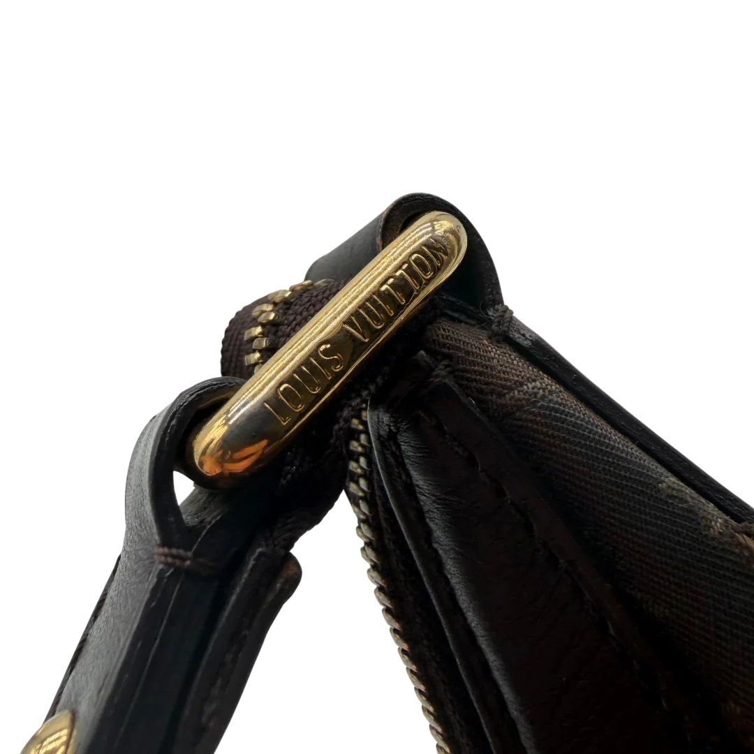 https://cdn.shopify.com/s/files/1/0564/9376/8855/files/Louis_Vuitton_Umhangetasche_Rhapsody_MM_aus_Denimstoff_braun_vintage_LV7431.webp?v=1779964088