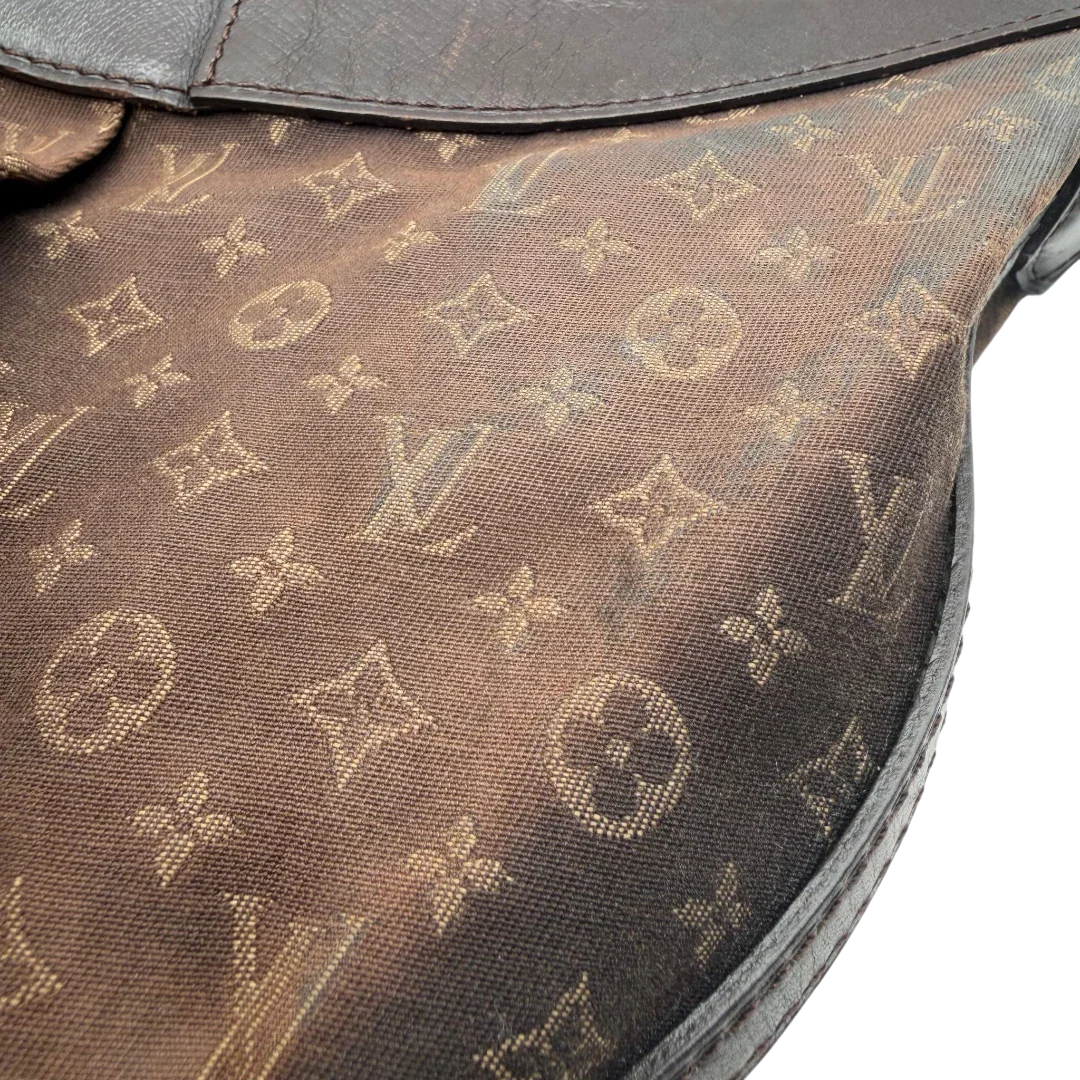 https://cdn.shopify.com/s/files/1/0564/9376/8855/files/Louis_Vuitton_Umhangetasche_Rhapsody_MM_aus_Denimstoff_braun_vintage_LV7433.webp?v=1779964088