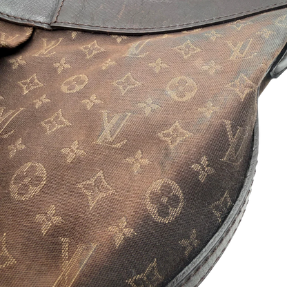 https://cdn.shopify.com/s/files/1/0564/9376/8855/files/Louis_Vuitton_Umhangetasche_Rhapsody_MM_aus_Denimstoff_braun_vintage_LV7433.webp?v=1779964088