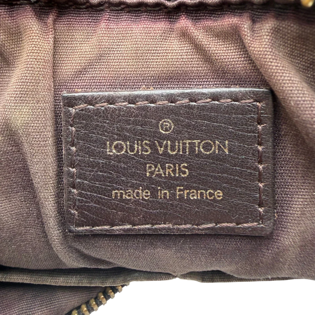 https://cdn.shopify.com/s/files/1/0564/9376/8855/files/Louis_Vuitton_Umhangetasche_Rhapsody_MM_aus_Denimstoff_braun_vintage_LV7435.webp?v=1779964089