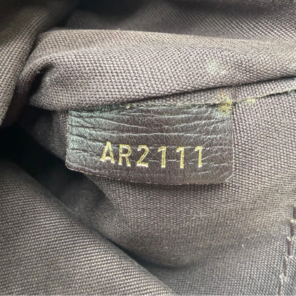 https://cdn.shopify.com/s/files/1/0564/9376/8855/files/Louis_Vuitton_Umhangetasche_Rhapsody_MM_aus_Denimstoff_braun_vintage_LV7436.webp?v=1779964089
