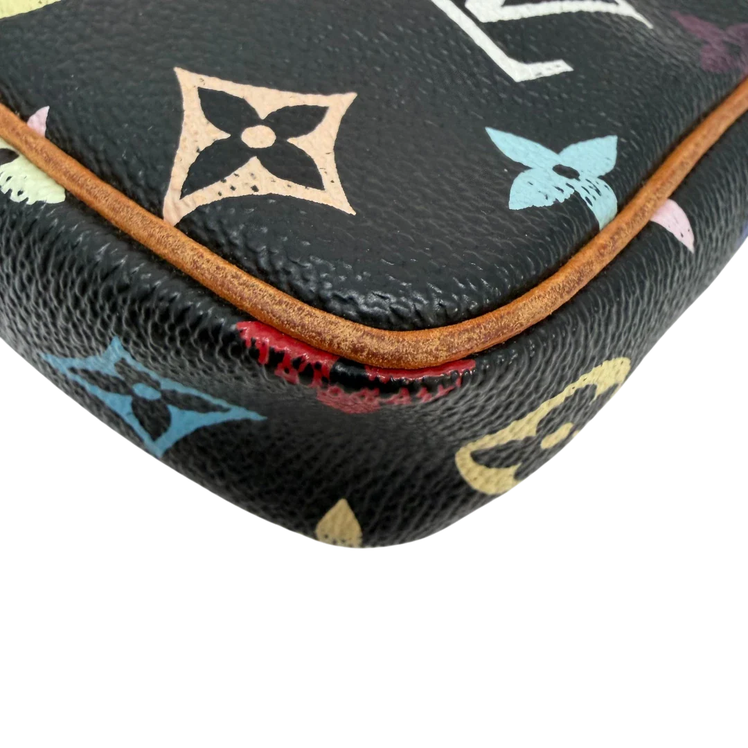 https://cdn.shopify.com/s/files/1/0564/9376/8855/files/Louis_Vuitton_x_Murakami_Pochette_Accessoires_monogram_schwarz_vintage_LV6884.webp?v=1779321151