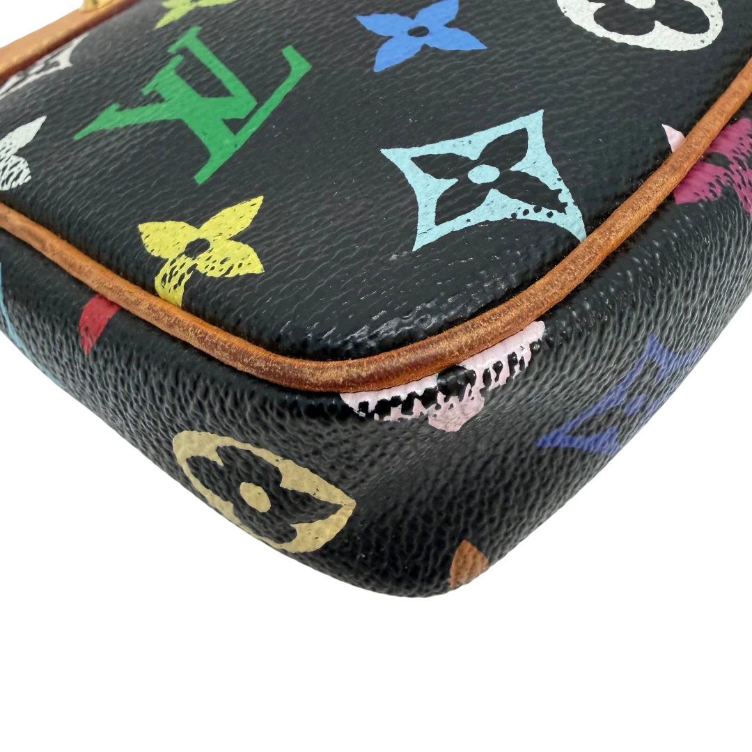https://cdn.shopify.com/s/files/1/0564/9376/8855/files/Louis_Vuitton_x_Murakami_Pochette_Accessoires_monogram_schwarz_vintage_LV6885.webp?v=1779321151