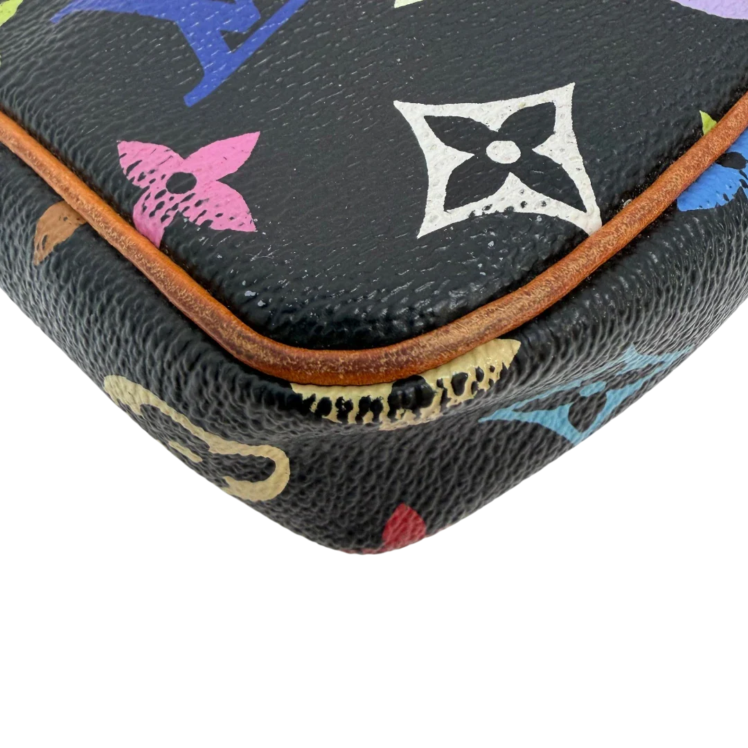 https://cdn.shopify.com/s/files/1/0564/9376/8855/files/Louis_Vuitton_x_Murakami_Pochette_Accessoires_monogram_schwarz_vintage_LV6887.webp?v=1779321151