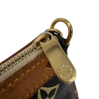 https://cdn.shopify.com/s/files/1/0564/9376/8855/files/Louis_Vuitton_x_Murakami_Pochette_Accessoires_monogram_schwarz_vintage_LV6889.webp?v=1779321152