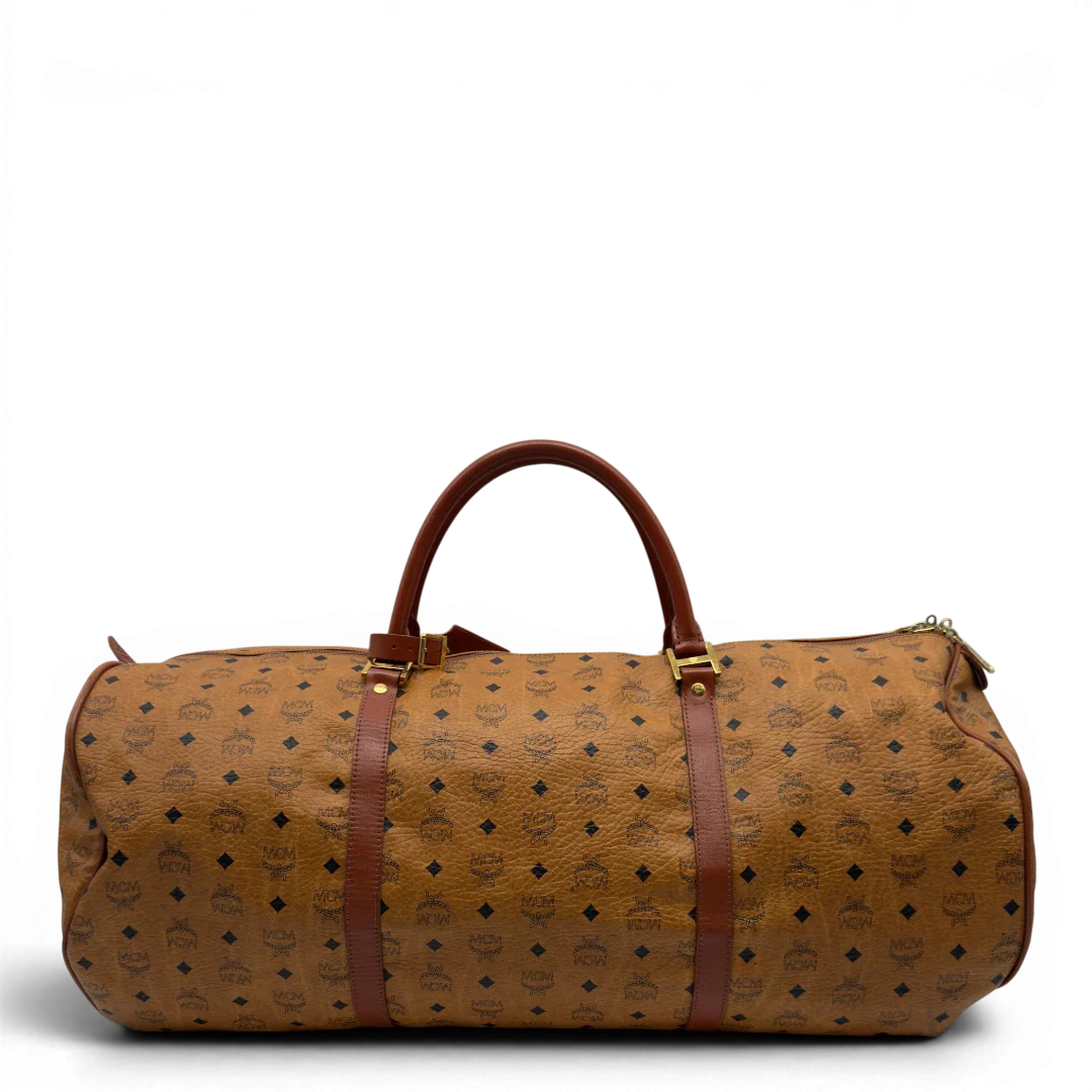 https://cdn.shopify.com/s/files/1/0564/9376/8855/files/MCMReisetascheGross5627.webp?v=1777464229